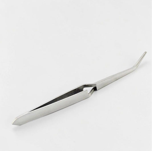 Зворотний пінцет для затиску арки